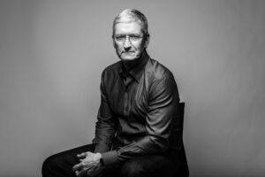 Tim Cook sitting on a chair
